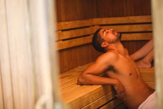 A wellness ritual — cold water plunge followed by sauna heat in a Scandinavian setting
